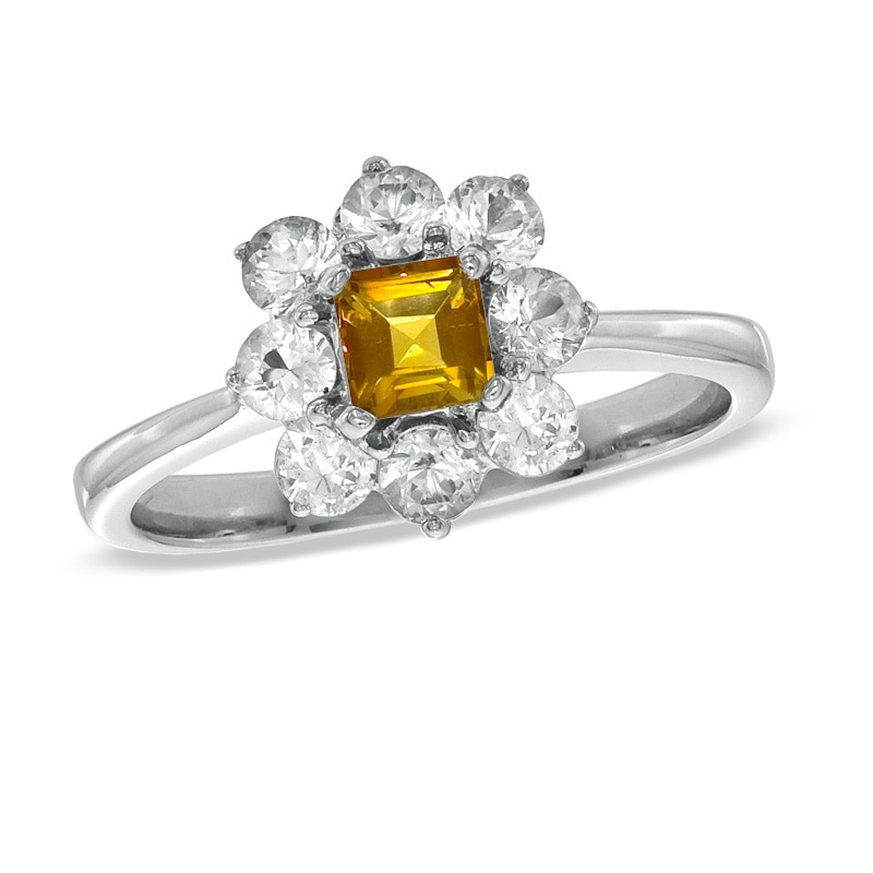 Женское кольцо из белого золота 585 пробы с цитрином и белым сапфиром