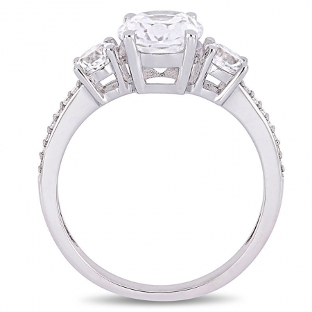 Помолвочное кольцо из белого золота с белым  овальным и курглыми сапфирами  и бриллиантами
